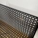 1950s black perforated metal planter in the style of Mathieu MATEGOT