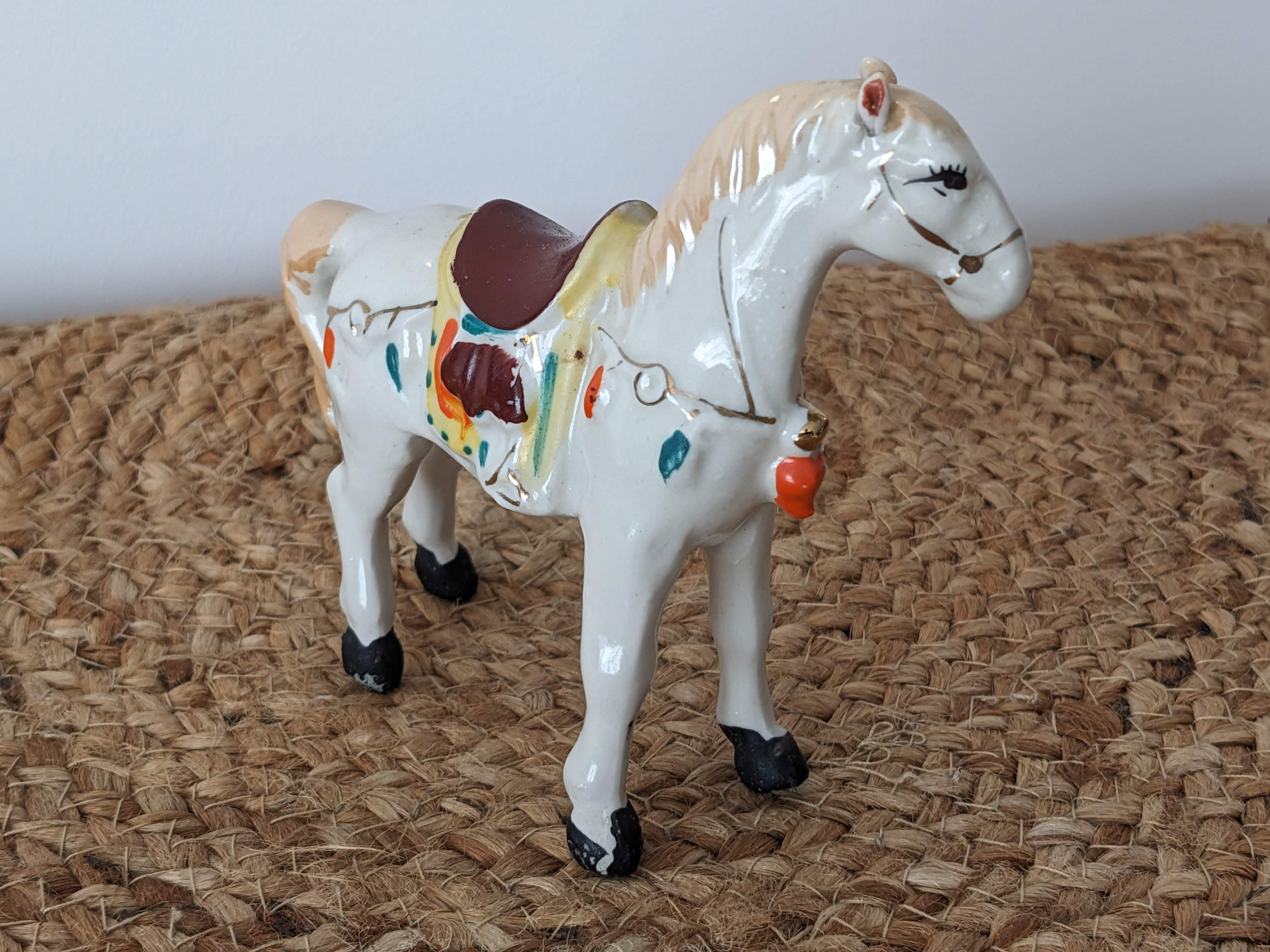 Painted porcelain horse statuette
