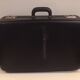Antique vintage black upholstered vintage suitcase