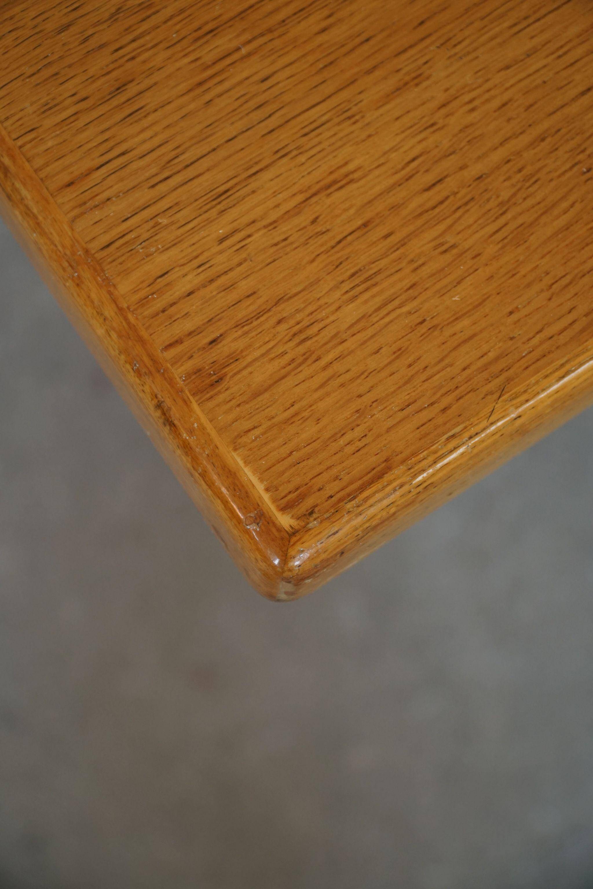 Mid-century brutalist dining table, made of oak, Danish craftsmanship, 1950s.