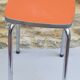 Orange formica stool