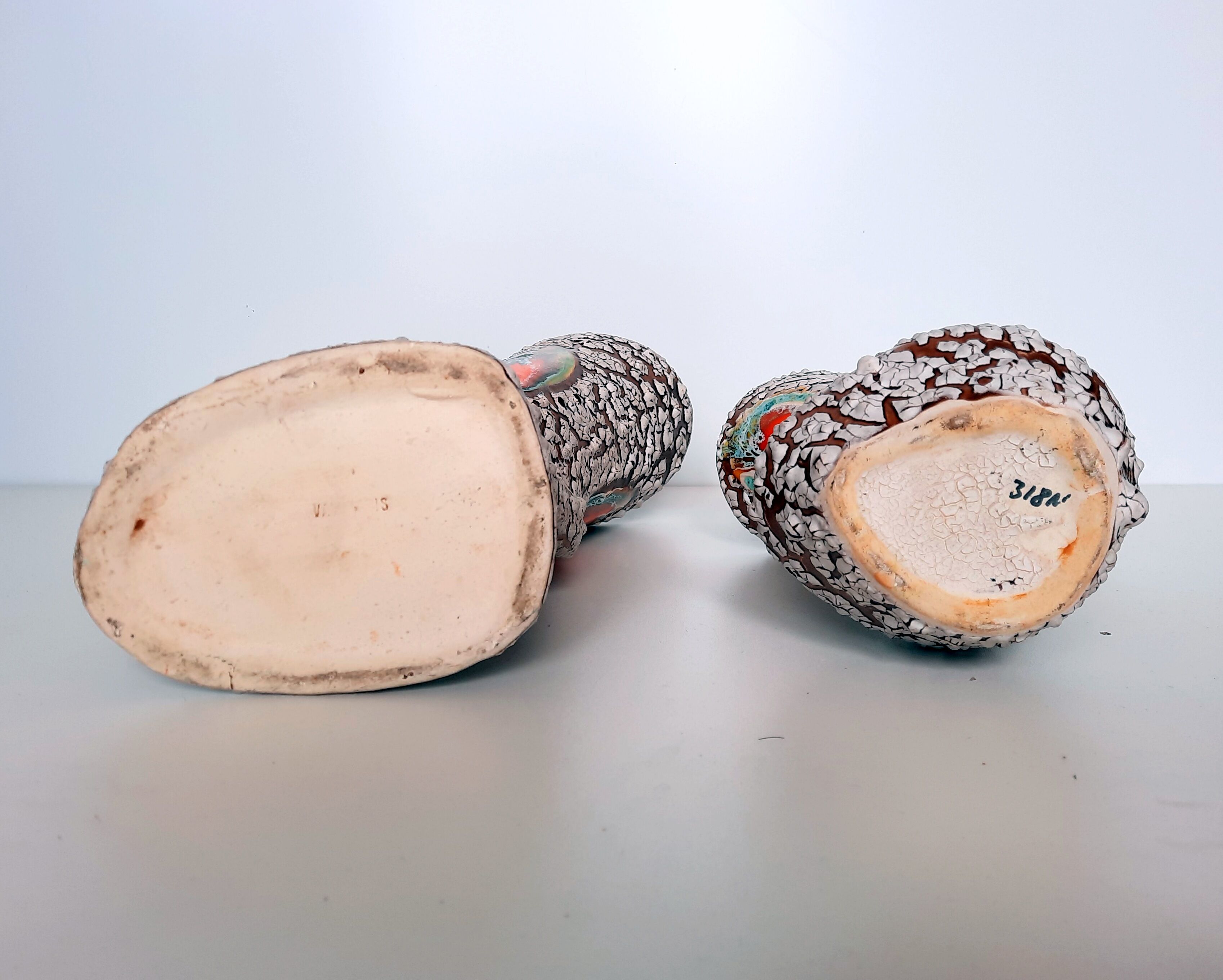 2 Vases of Vallauris in ceramic swaddled volcanic effect.