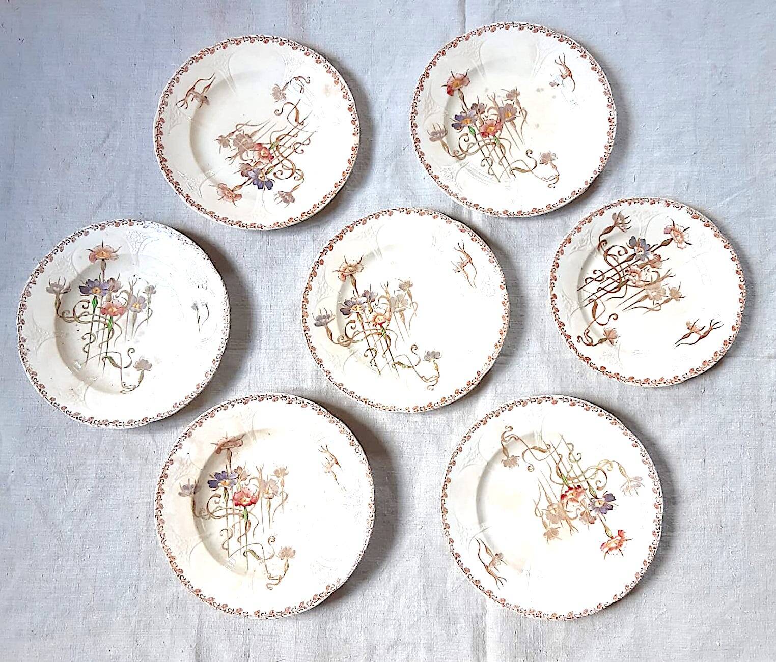Set of 7 nielles model plates in longwy earthenware, art nouveau, circa 1900