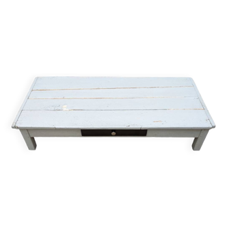 (very) low painted table, one drawer