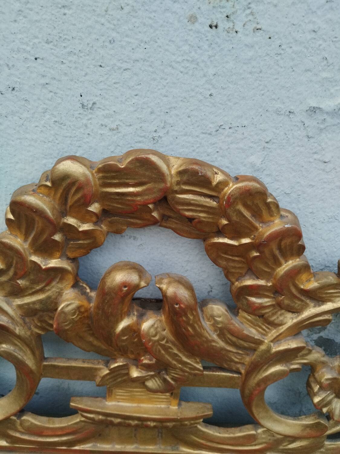 Antique gilded wooden mirror in Louis XVI style
