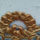 Antique gilded wooden mirror in Louis XVI style