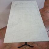 Table de bistrot piètement fonte dessus marbre