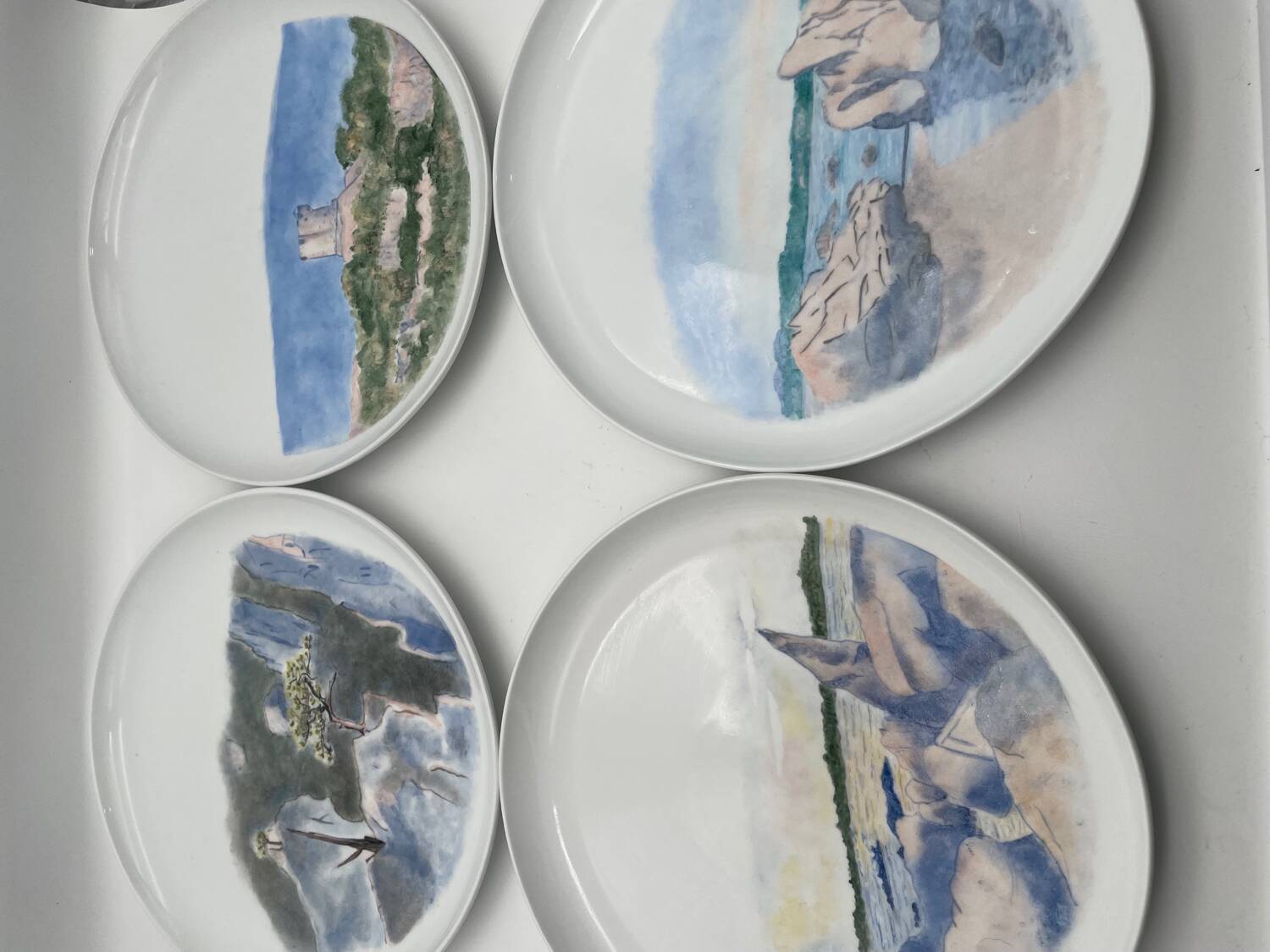 Hand painted porcelain plate with landscape decoration