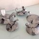 Suite of five candlesticks in brushed metal / vintage 60s-70s
