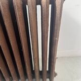Ancien radiateur sur pied a quatorze lames fleuries en fonte de fer XX sièc