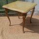 Vintage side table in gilded brass with an onyx top.