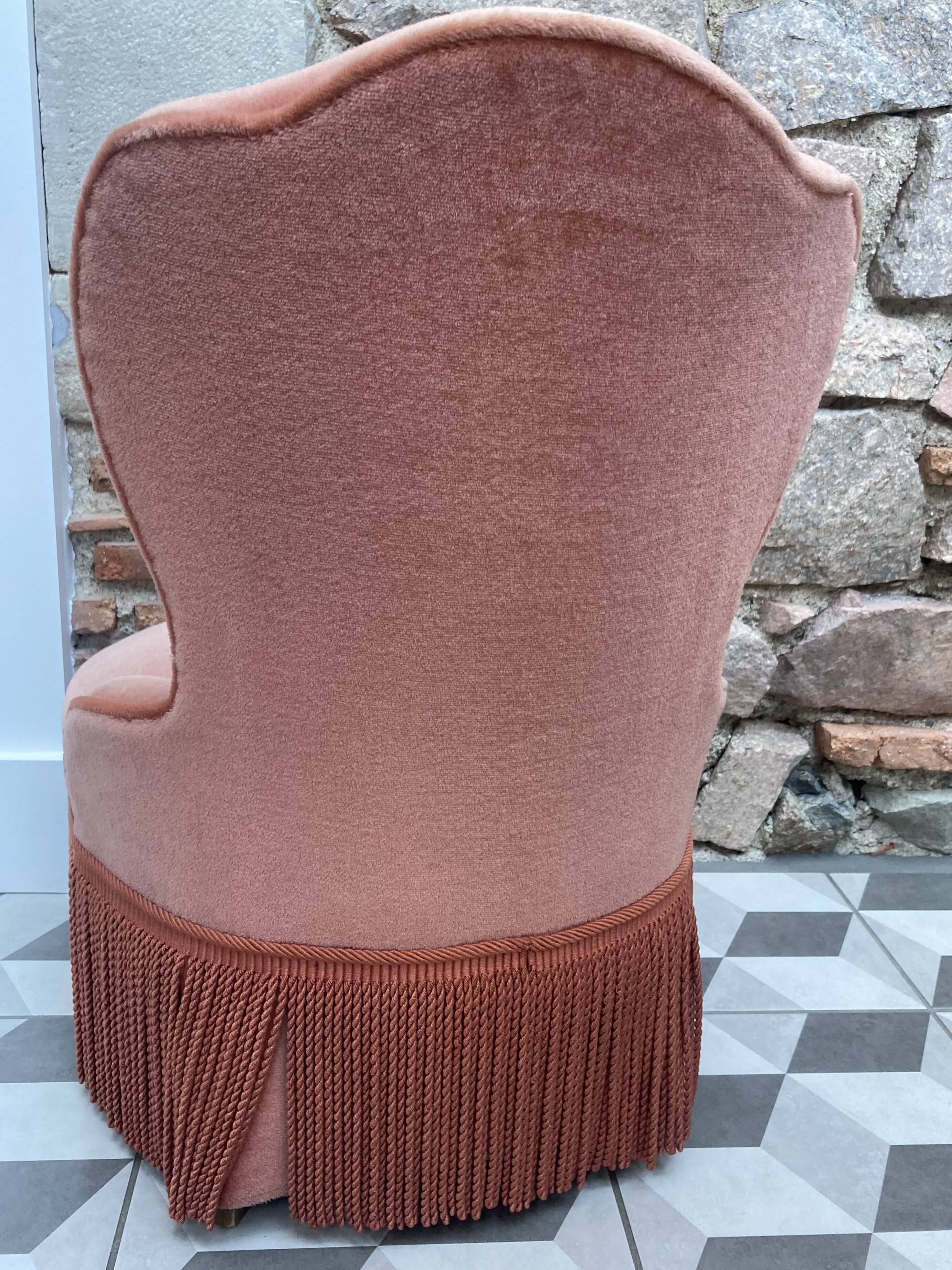 Fauteuil chauffeuse vintage velours saumon