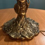 Brass foot table lamp with Tiffany style decor