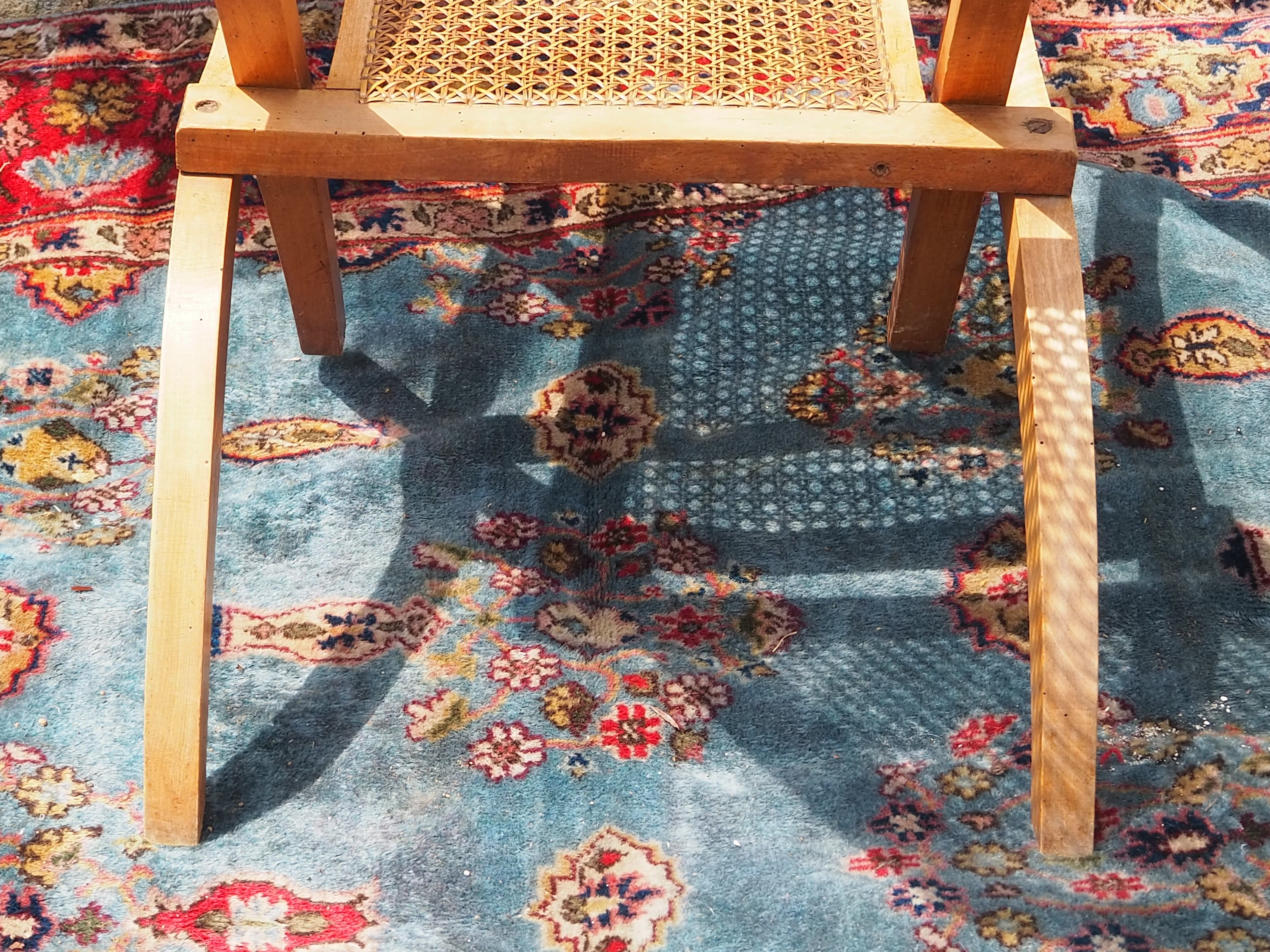 Cane folding armchair in solid wood