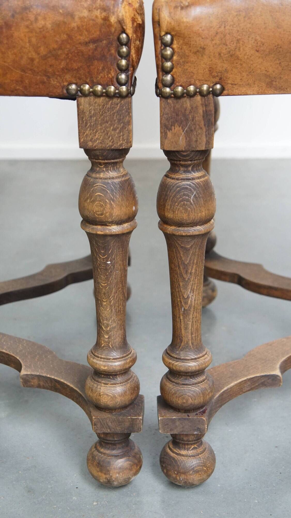 Set of 4 antique wooden and sheepskin leather dining chairs