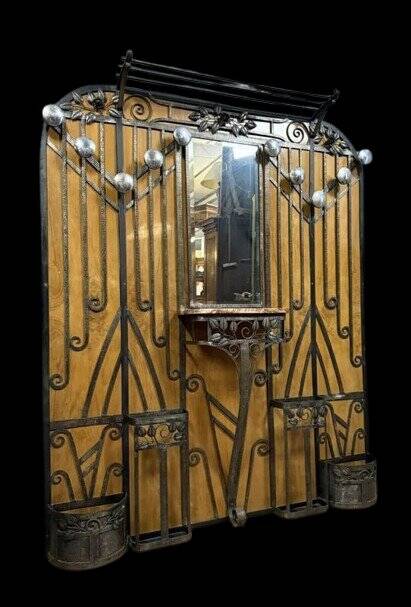 Maison Moutard: Monumental coat rack from the Art Nouveau period in wrought iron.