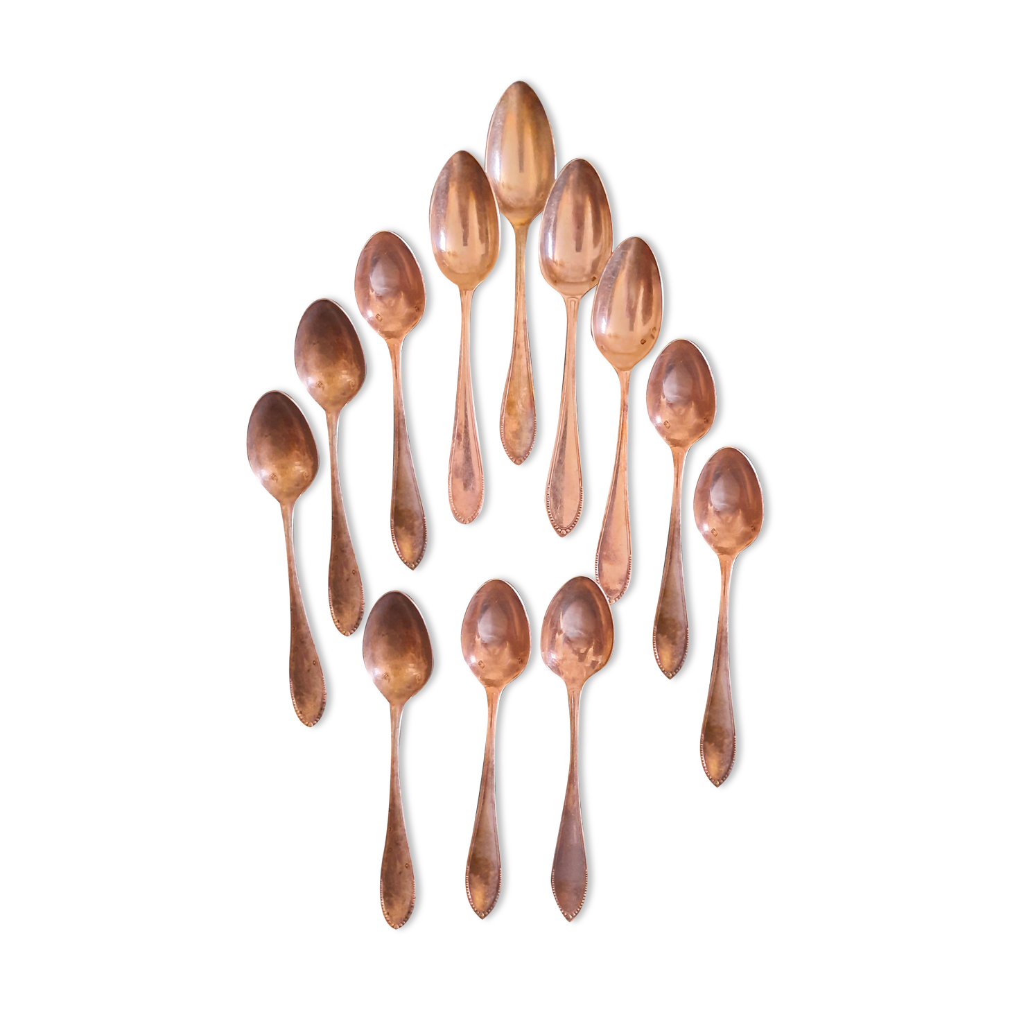 12 teaspoons silver metal
