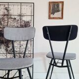 Pair of black metal and blue fabric chairs