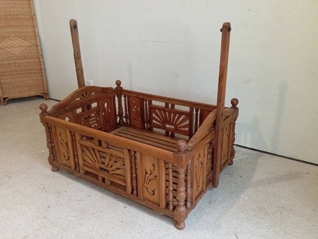 Solid teak carved swing cradle