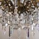 Lustre bronze ancien a pampilles cristal et verre 12 bras 18 lampes