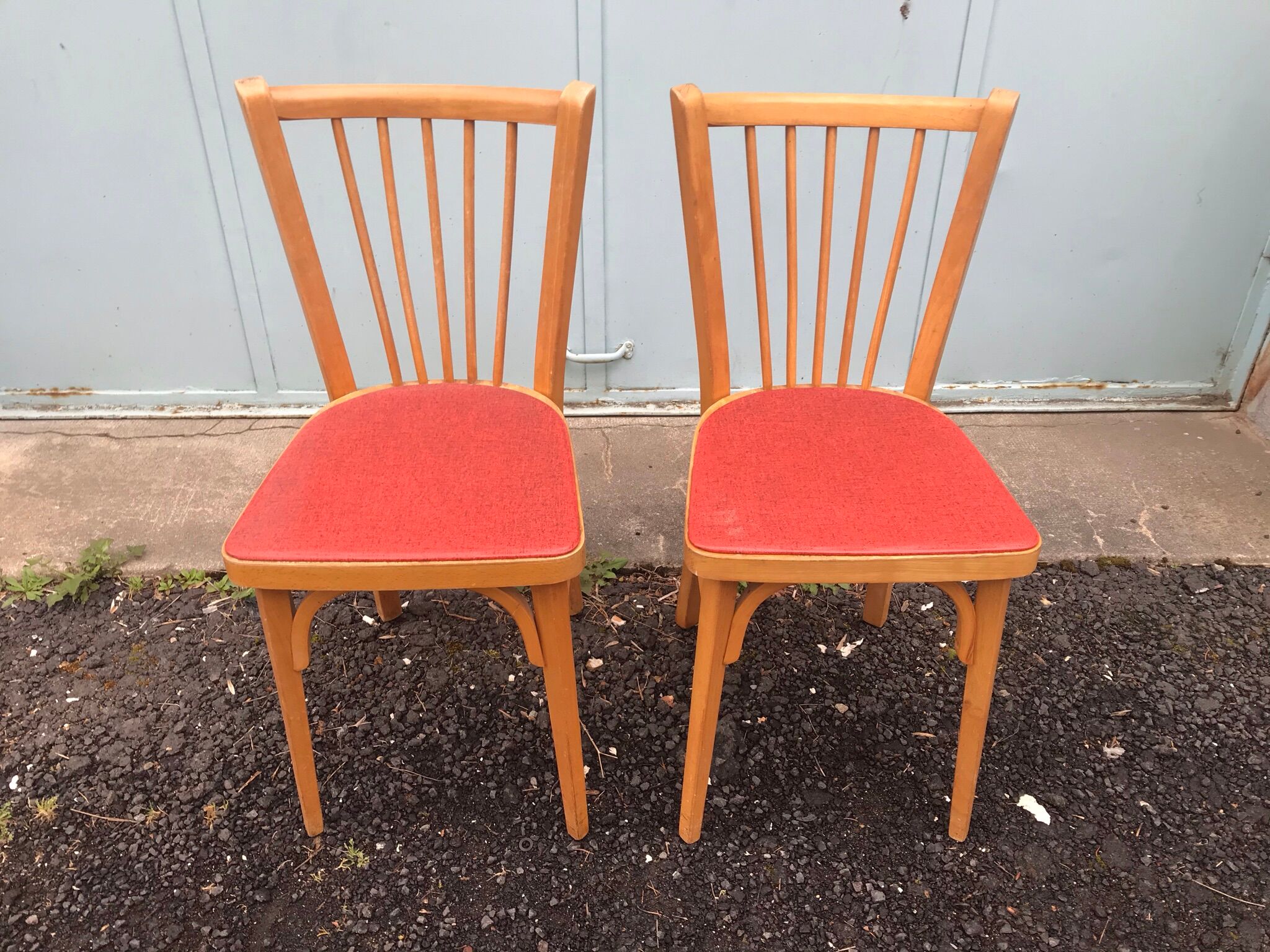 2 red Baumann bistro chairs