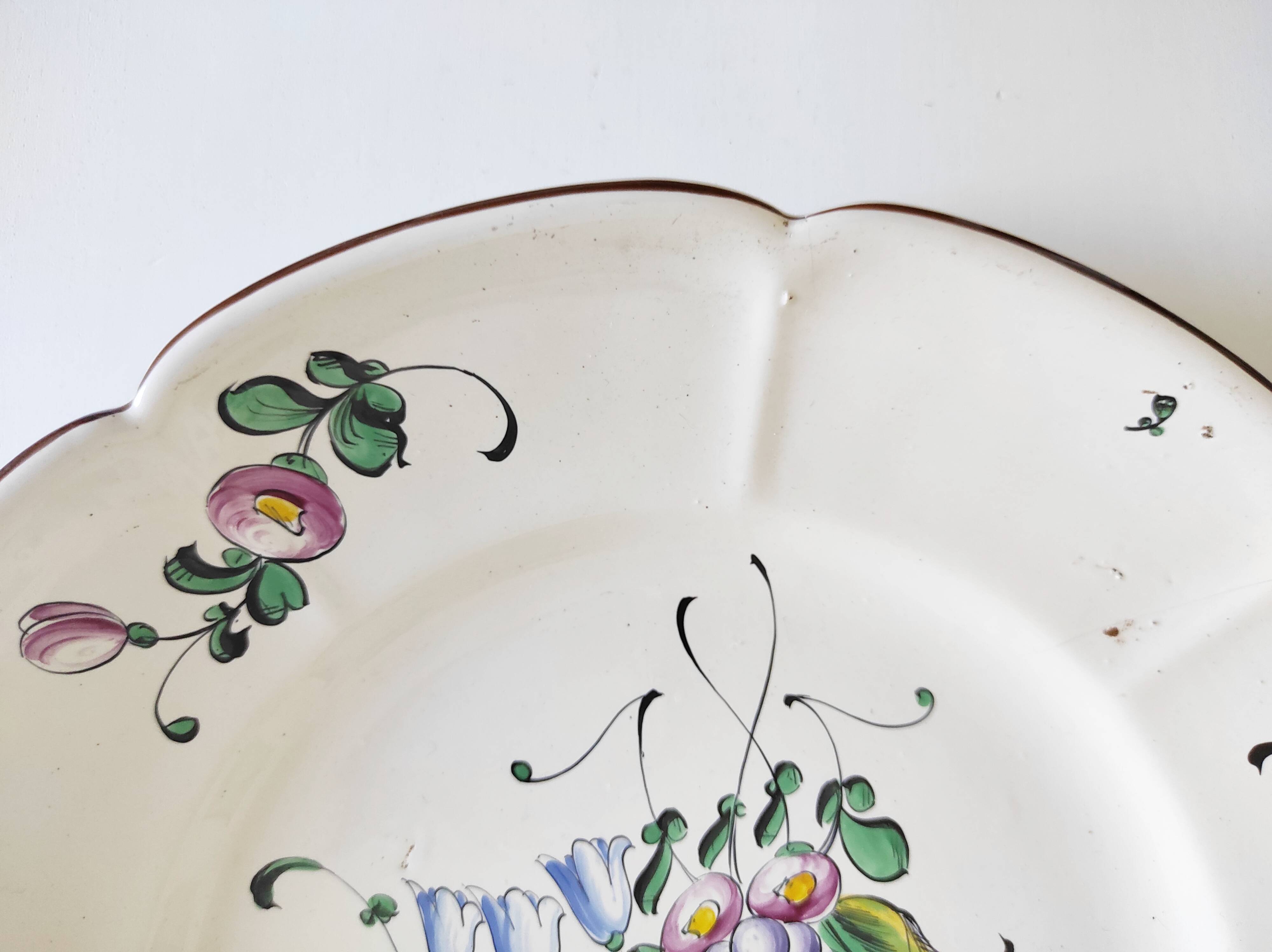 Eastern earthenware plate with flowers