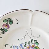Eastern earthenware plate with flowers