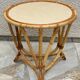 Round coffee table in vintage rattan