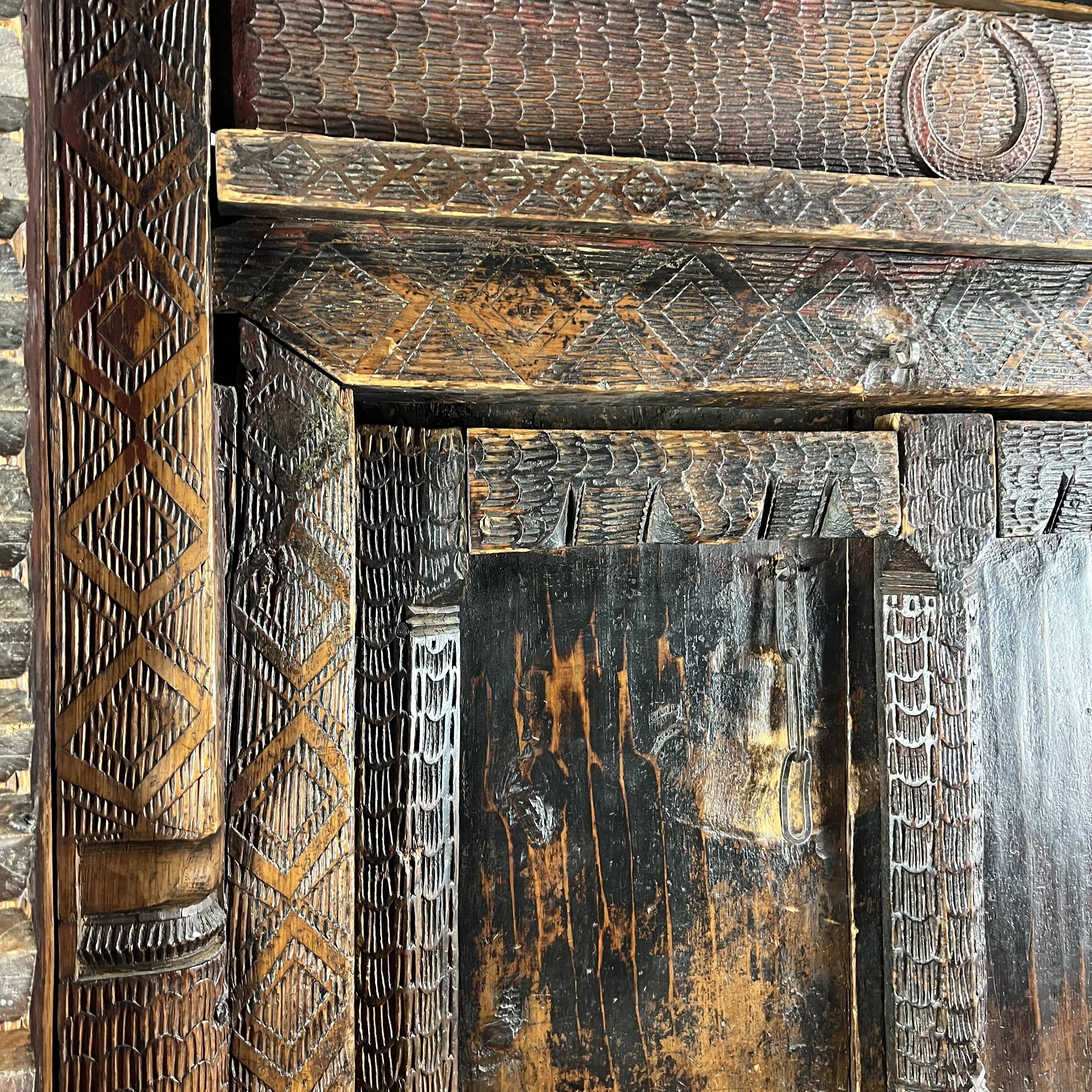 Afghan door in carved wood from the late 19th century with Palace Temple framing.