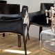 Set of 6 black leather armchairs from the 1970s