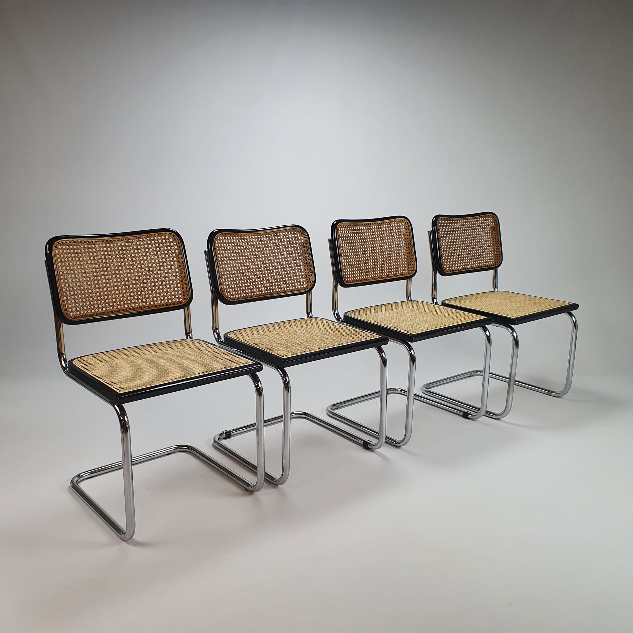 Set of 4 tubular frame and cane cantilever dining chairs Breuer Marcel italy, 1970s