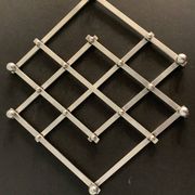 Paire de dessous de plat anciens extensibles métal argenté 1940