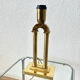 Vintage table lamp in gilded brass Hollywood Regency style.