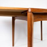 Dining table with extentions in teak designed by Henning Kjærnulf from the 1960s.