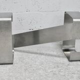Coffee table with "kinetic" steel base and glass slab. Circa 1970.