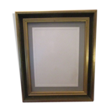 Old wooden and gilded stucco frame