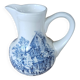 Small old pitcher in iron earth