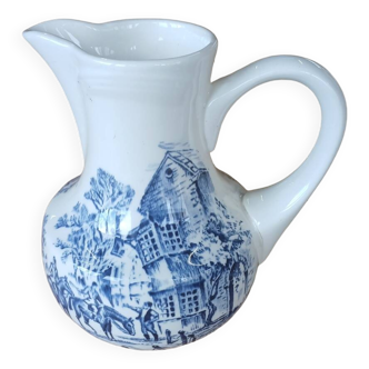 Small old pitcher in iron earth