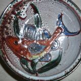 Frying pan with fat lava and ceramic fish decor