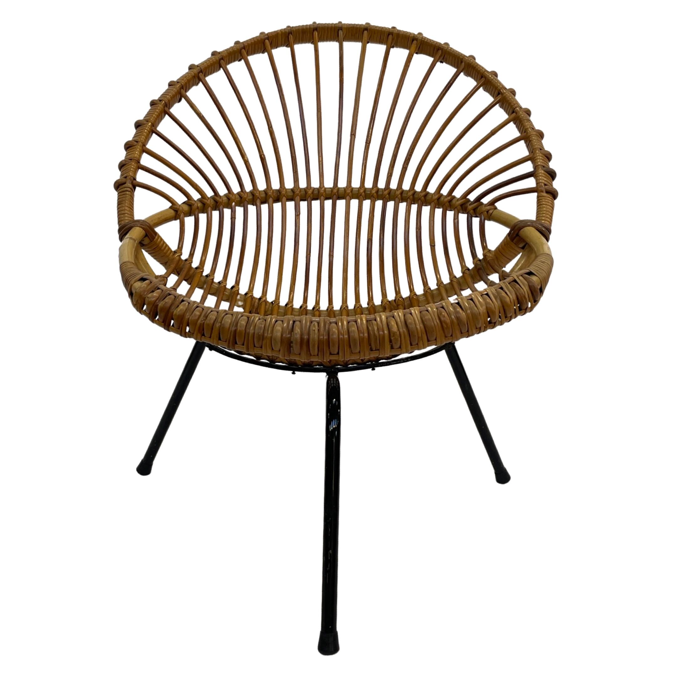 Tripod Rattan easy chair by Dirk van Sliedregt Rohe Noordwolde 1960 in the Netherlands