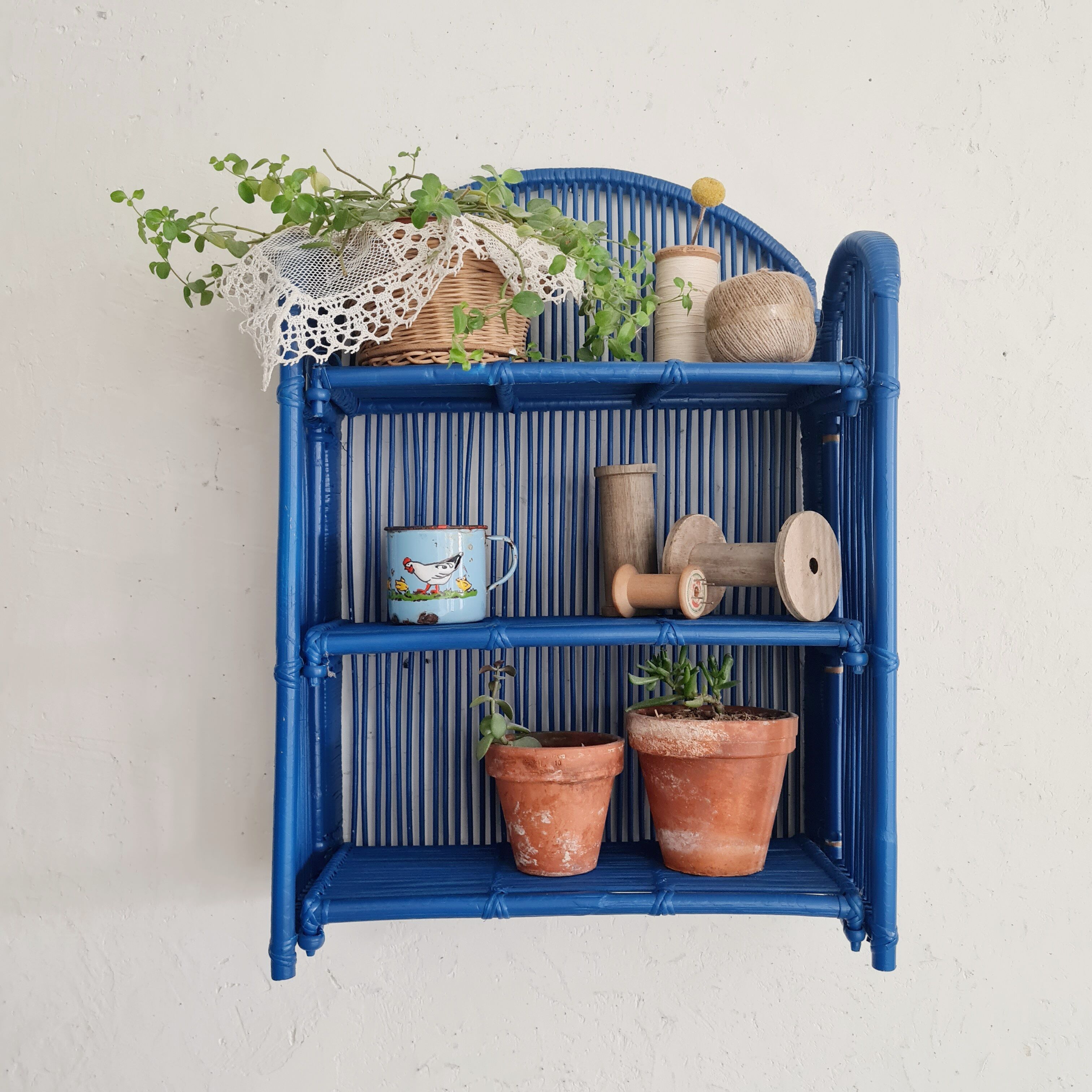 Vintage shelf in Klein blue rattan