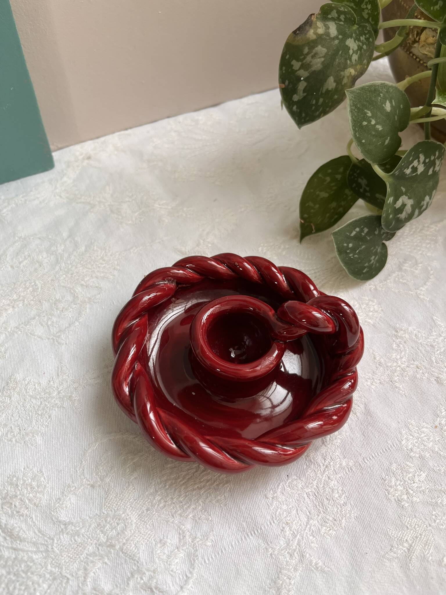 Twisted red earthenware candle holder - in the style of St Clément