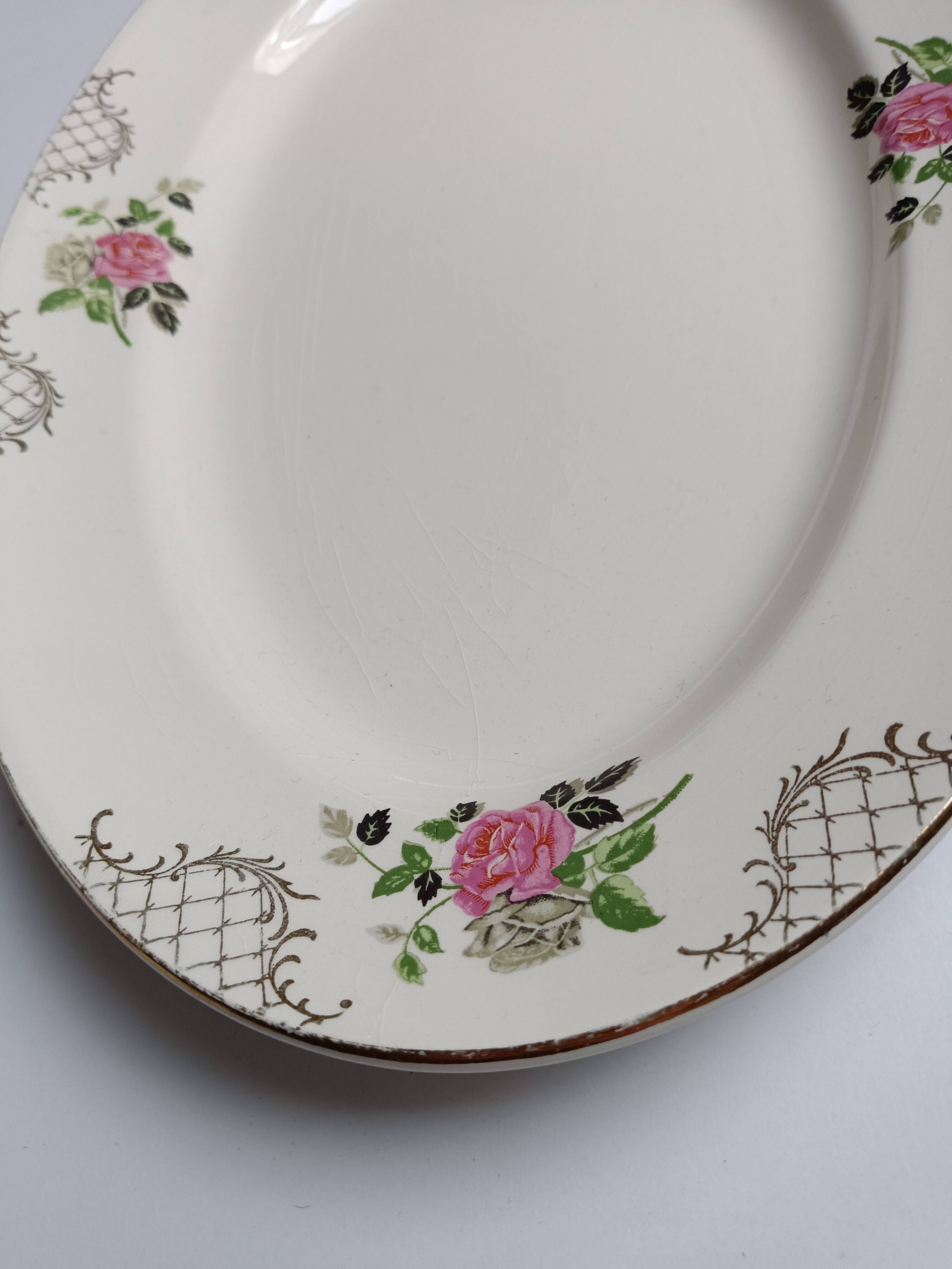 Oval plate Sarreguemines cream with pink gilding, antique.