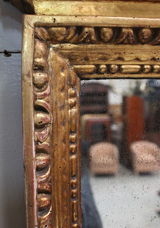 Golden Wooden Mirror with Winged Animal Decorations - Late 19th Century