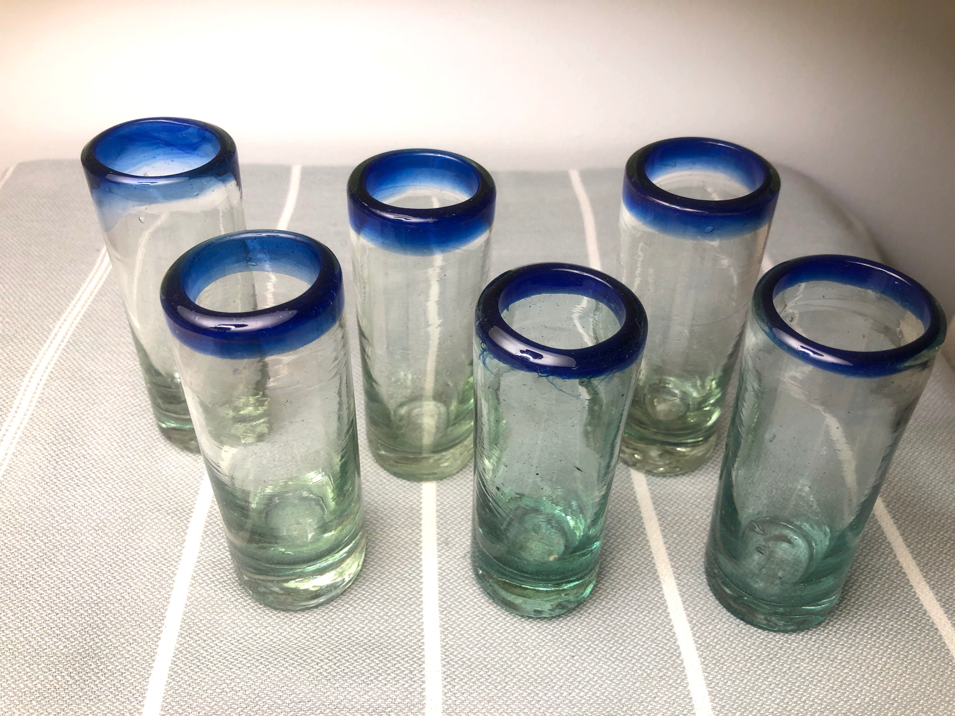 Handmade cobalt blue tequila glasses made of recycled glass