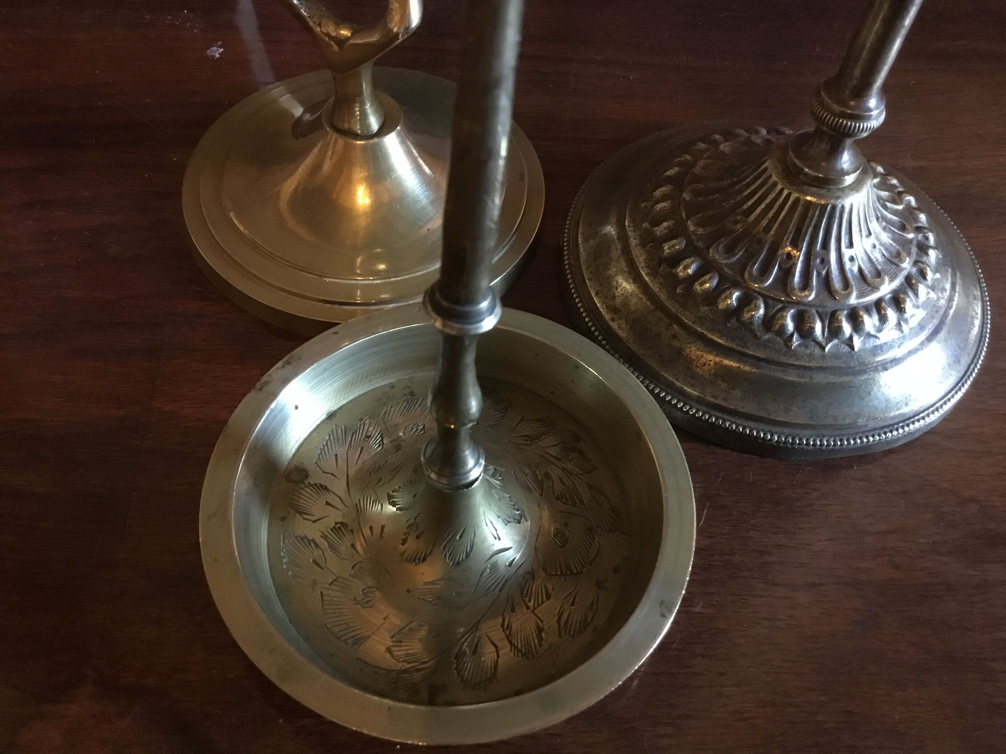 Three old candlesticks