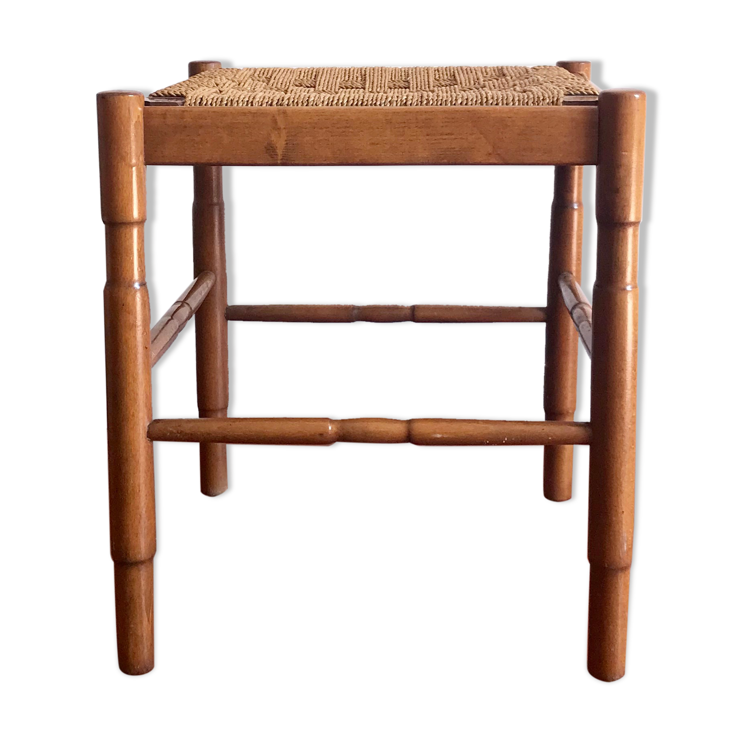 Wooden stool and rope