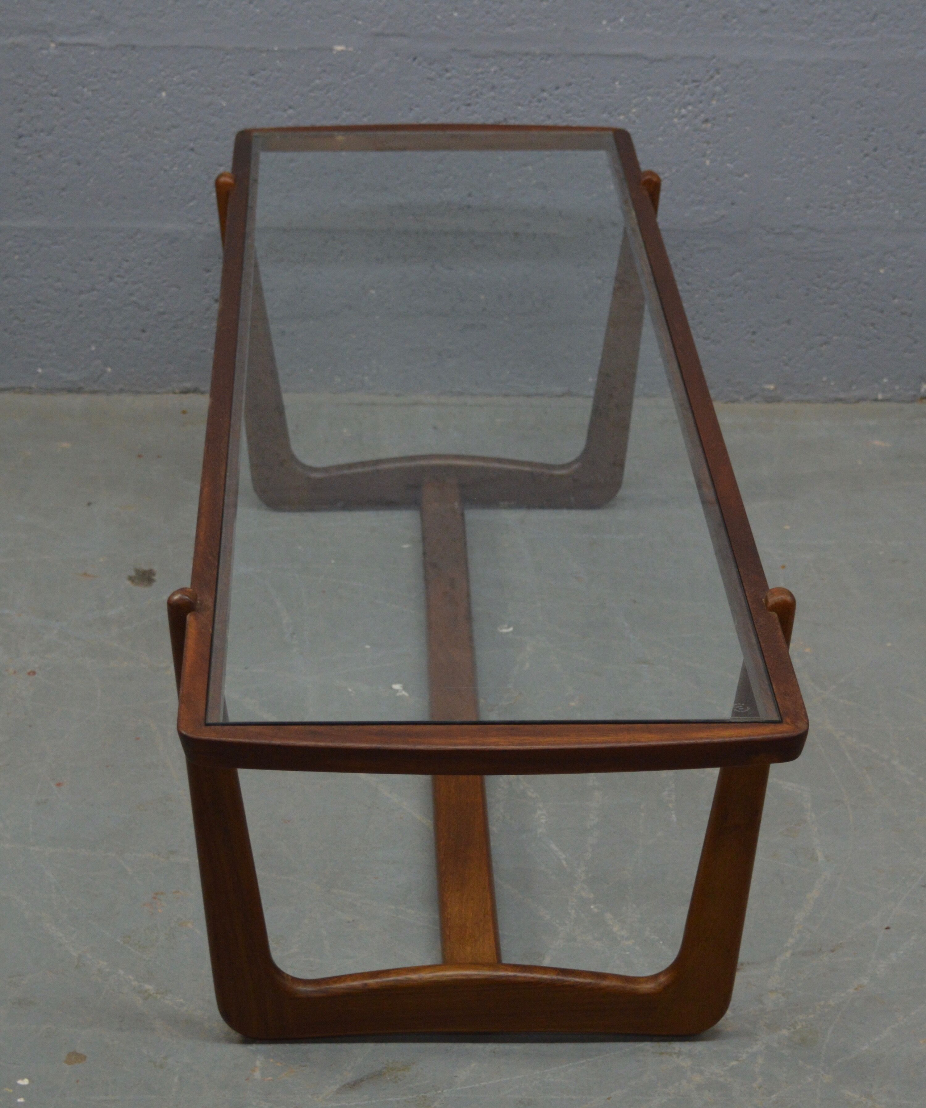 Mid century glass topped coffee table