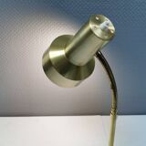 Older Swedish table lamp, estimated 1980s, in gold-colored aluminum with “bend”.