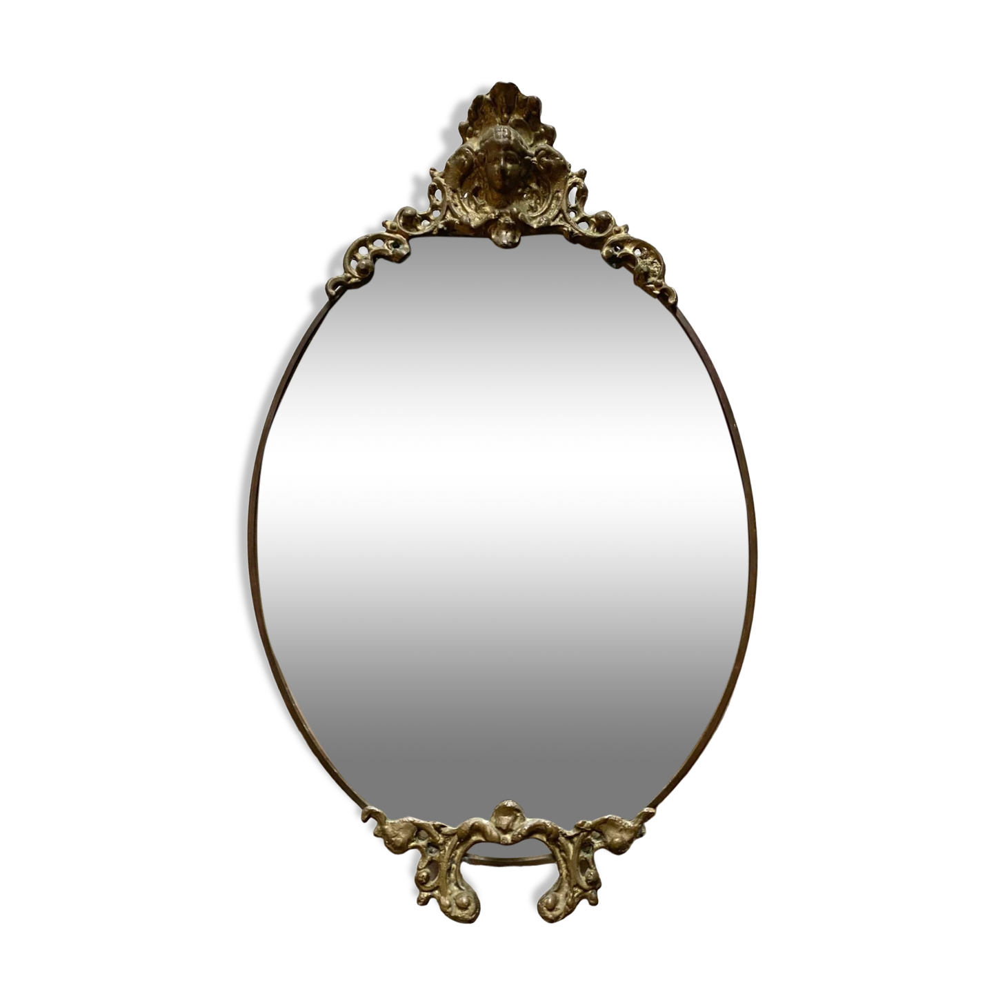 Antique oval brass crest mirror, 41x26 cm